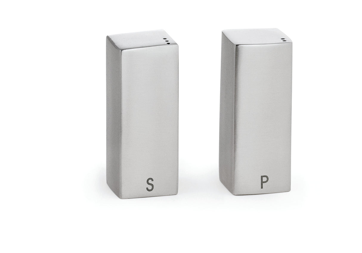 This stainless steel Salt/Pepper Shaker Set features two upright shakers labeled "S" and "P." Both are dishwasher safe, with small holes on flat tops, making them practical and stylish for any kitchen.