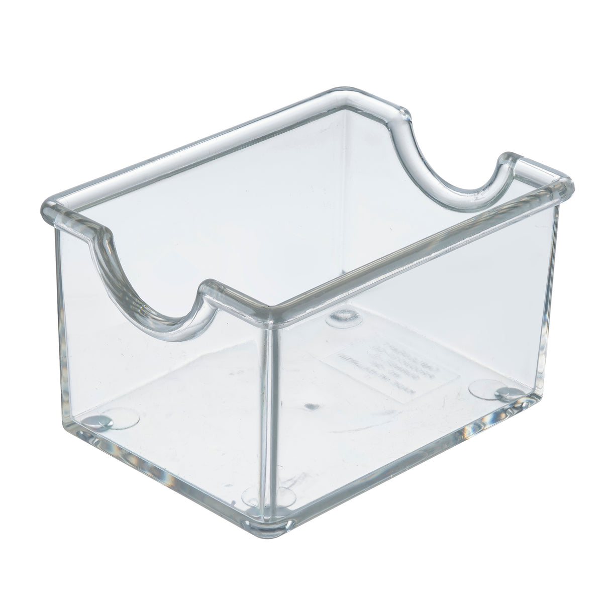 A clear acrylic Sugar Packet Holder by TableCraft, featuring an open top, curved cutouts on each side, four rounded corners, and raised feet. Its smooth surface is dishwasher safe for easy cleaning and long-lasting use.