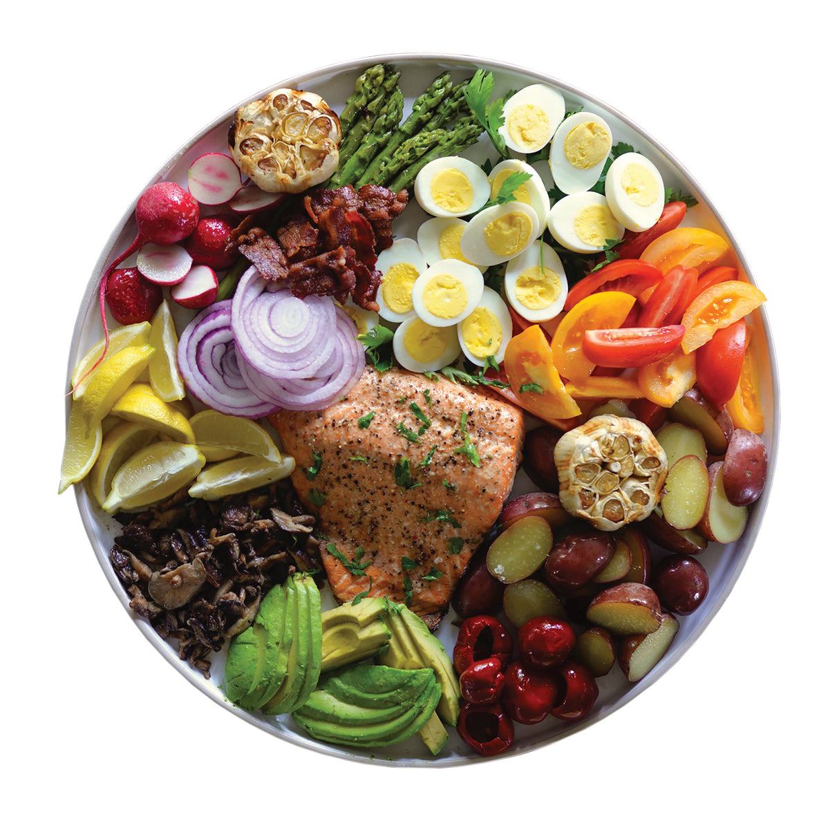 A large white melamine bowl filled with a colorful salad: grilled salmon in the center, surrounded by avocado, mushrooms, lemon wedges, bacon, peppers, baby potatoes, and more. Durable and dishwasher safe for easy cleanup.