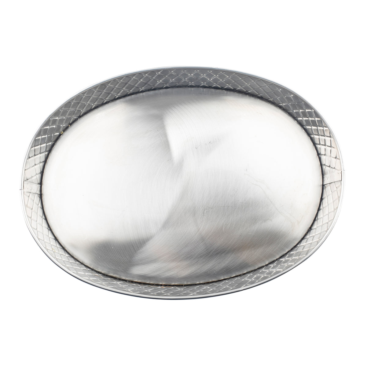 A shiny, oval-shaped stainless steel Lattice Collection platter with a smooth center and a raised, textured lattice pattern along the outer edge. The tray reflects light, showing subtle surface scratches and brushed metal marks.