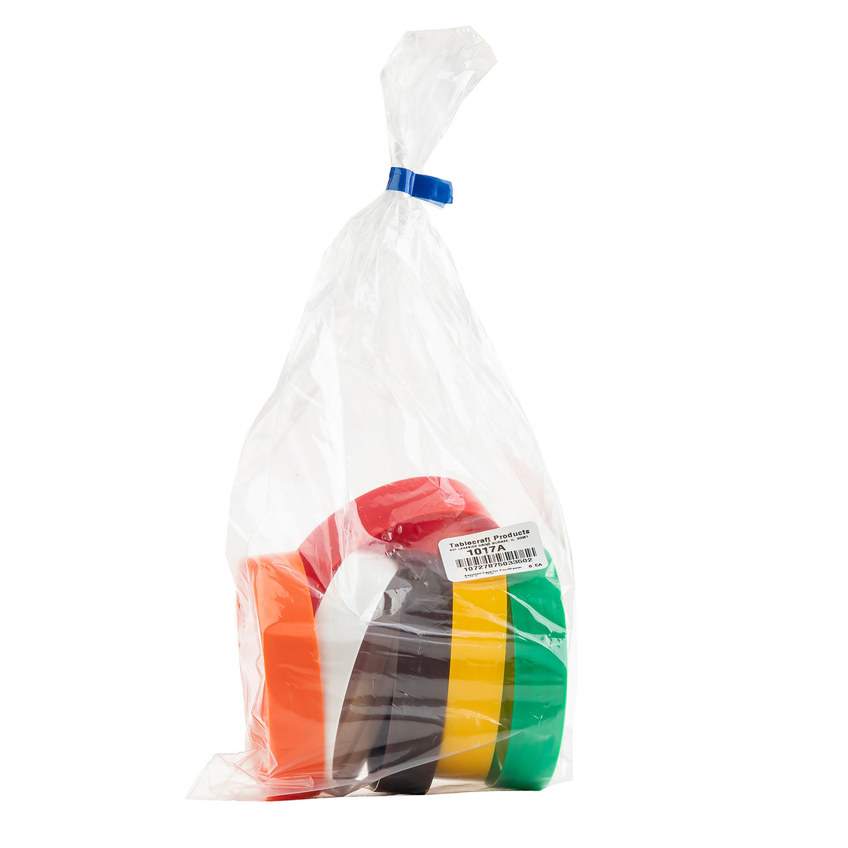 A clear plastic bag, sealed with a blue tie, contains five rolls of colored tape—orange, red, black, yellow, and green—stacked vertically. A white product label with a barcode is affixed to the red roll. Fits PourMaster by TableCraft. Background is white.