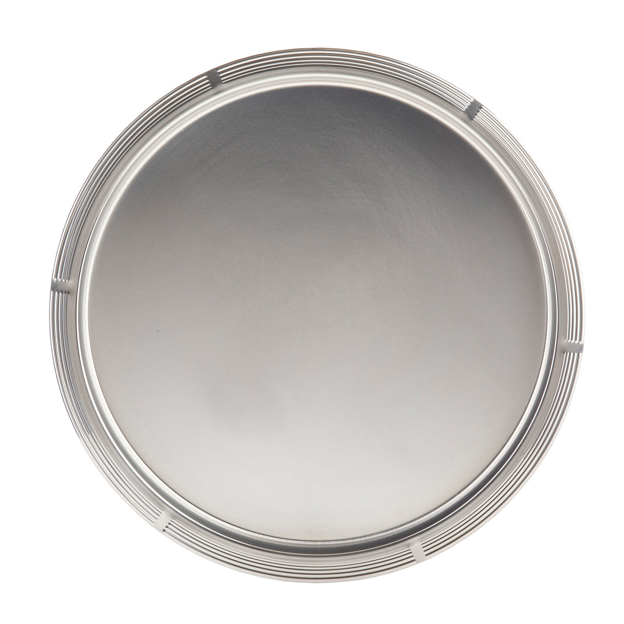 A round, silver stainless steel tray viewed from above. The tray features a smooth, shiny surface and a raised rim with evenly spaced, thin ridges adding texture and decoration. The center of this TableCraft tray is plain and unadorned.