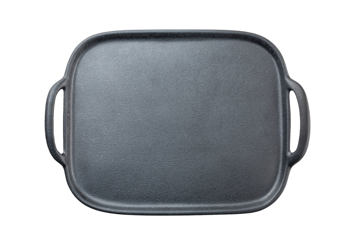 A square black TableCraft 10331 cast iron griddle with rounded edges and two side handles, photographed from above on a white background. The textured, uncoated surface and integrated handles make lifting easy.