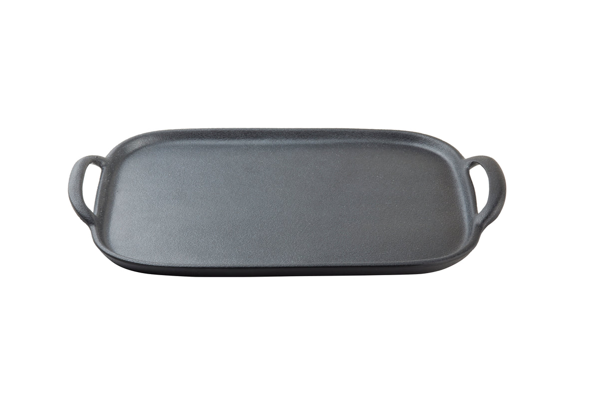A rectangular, flat, black TableCraft 10331 faux cast iron tray with slightly raised edges and two curved handles on each short side, shown on a white background.
