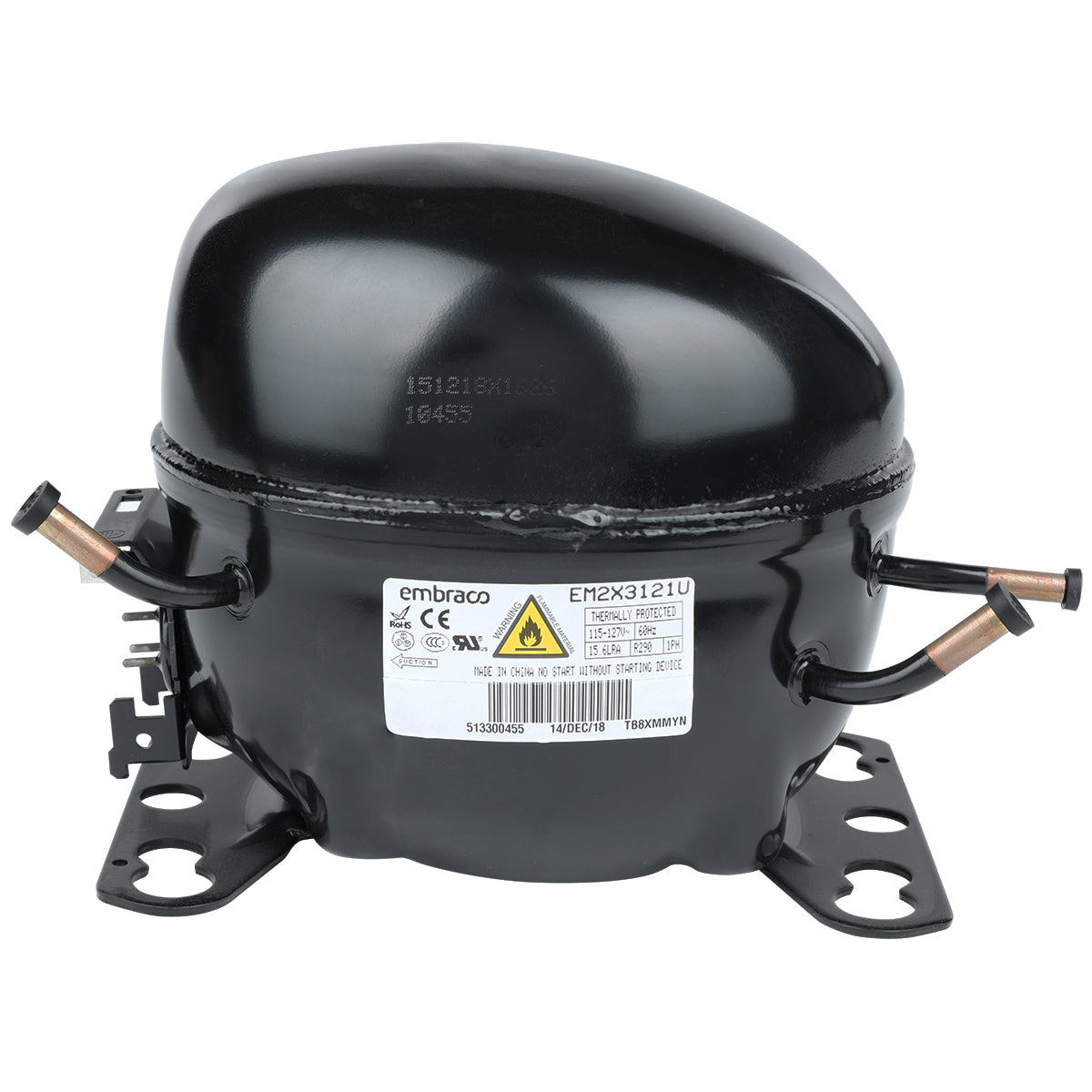 A black, dome-shaped refrigerator compressor with two mounting brackets at the base, labeled “Embraco.” Featuring copper pipes on each side and a warning label, it is a key component in Empura Refrigeration systems. The surface is glossy and industrial.