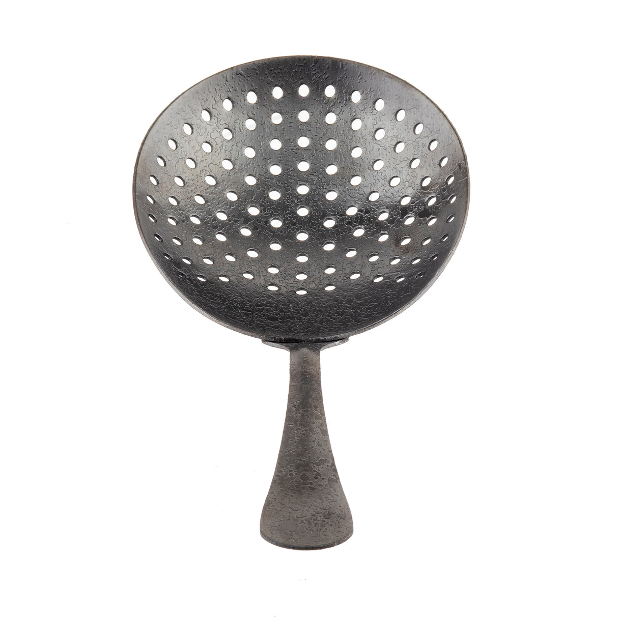 A perforated metal ladle, resembling a Julep Strainer, features a wide, round bowl with evenly spaced holes and a short handle. Its textured surface and black acid etch finish evoke the look of dark, aged metal against a white background.