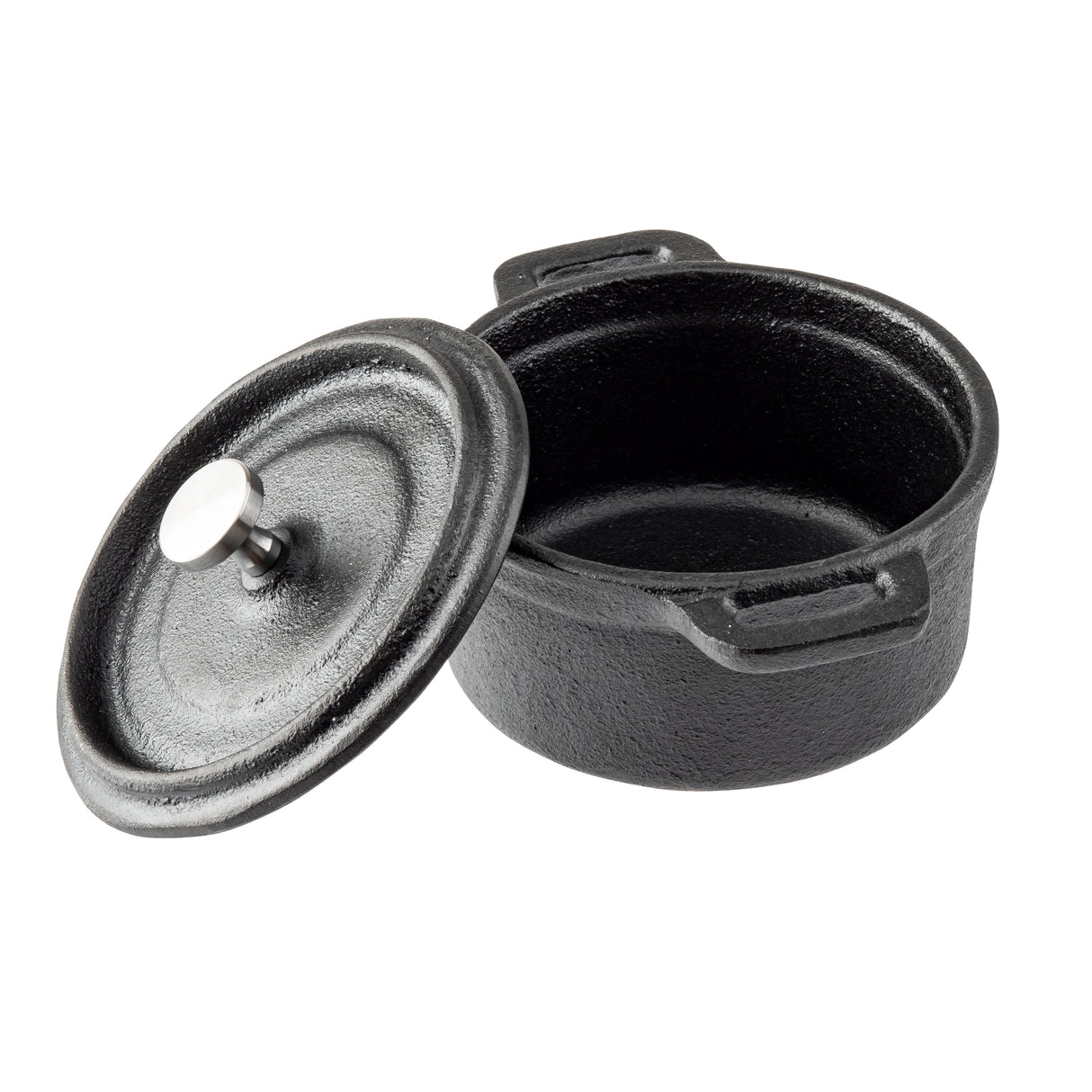 A black cast iron cocotte with a matching lid slightly askew, revealing the empty interior. The pot features two small handles, a round metal knob on the lid, and a textured, matte finish—perfect for rustic TableCraft presentations.