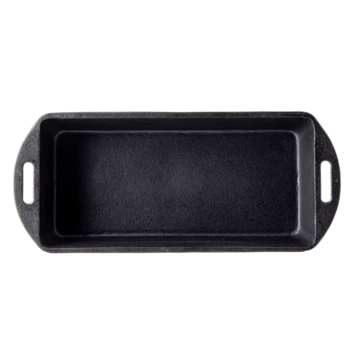 A rectangular cast iron loaf pan is shown from above. It has slightly rounded corners and two handles with oval cutouts on each short end. The textured inside surface of the loaf pan appears empty.
