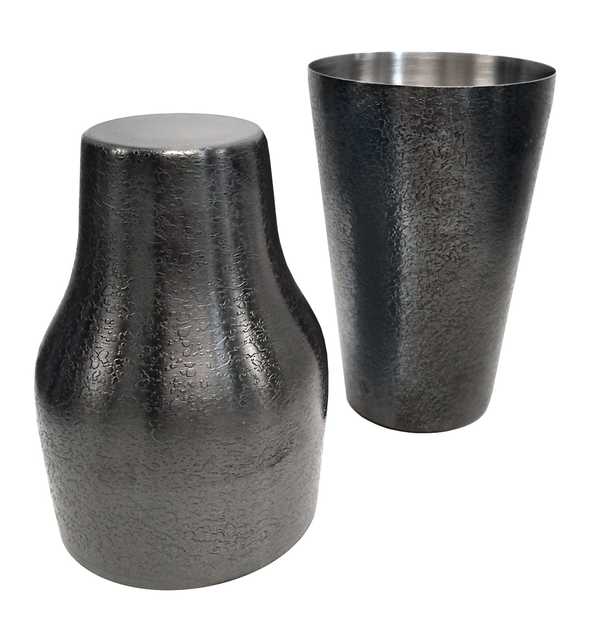 Two premium stainless steel cocktail shaker tins are shown. One is upright and cylindrical with a flared top, while the other is upside down with a wider, rounded base. Both have a textured, hammered dark finish and a smooth metallic interior.
