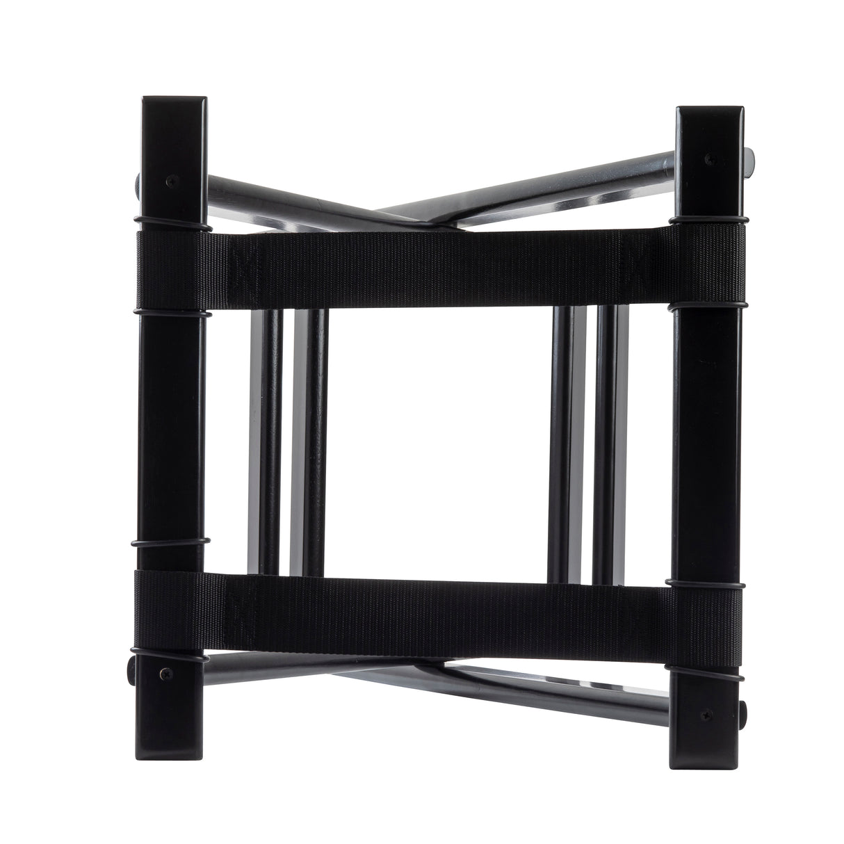 A top-down view of a black, metal folding luggage rack with two crossed support bars and two wide, parallel nylon straps forming a surface to hold items—ideal as a tray stand. The rack's square-shaped legs join at the corners. The background is white.