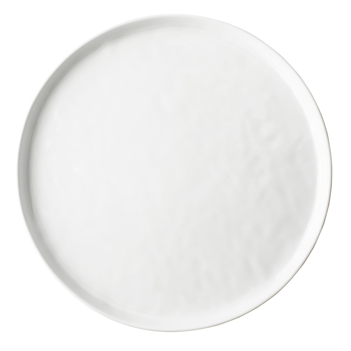 A plain, round white Ridge Collection Serving Plate with a slightly raised rim, photographed from above against a white background. The plate is empty and unadorned, showcasing a smooth, glossy surface and simple, minimalist design.