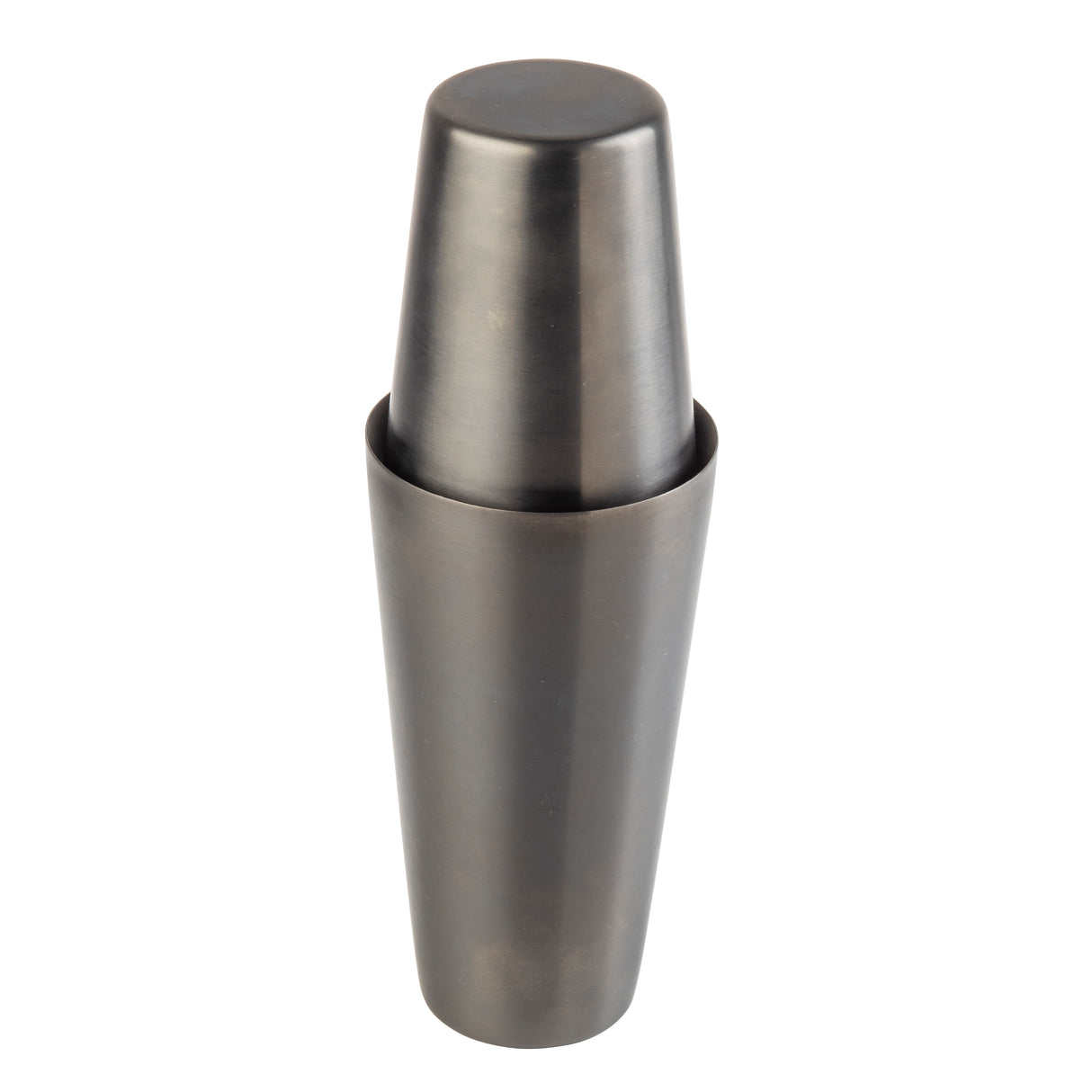 A stainless steel cocktail shaker with a sleek gunmetal finish stands upright. The top cap fits securely onto the larger base, creating a smooth, cylindrical silhouette. Its dark, matte surface is modern and free from any visible markings.