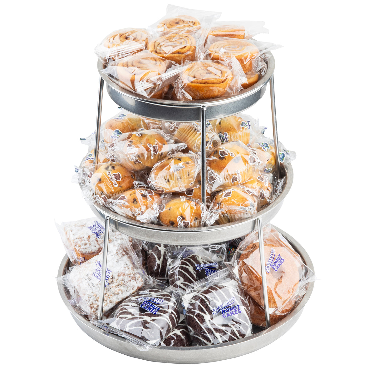 A 3-tier stainless steel sharing tower displays assorted individually wrapped pastries, including muffins, cinnamon rolls, chocolate cakes, and powdered sugar pastries, all arranged neatly on each tier against a white background.