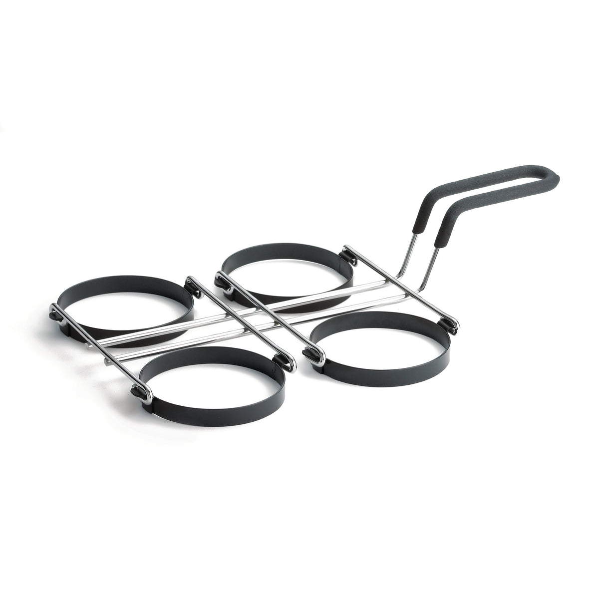 A metal kitchen utensil with four non-stick egg rings arranged in a grid and connected by metal bars, featuring a handle with a black grip. Designed for cooking evenly shaped eggs or pancakes. Dishwasher safe. The background is white.