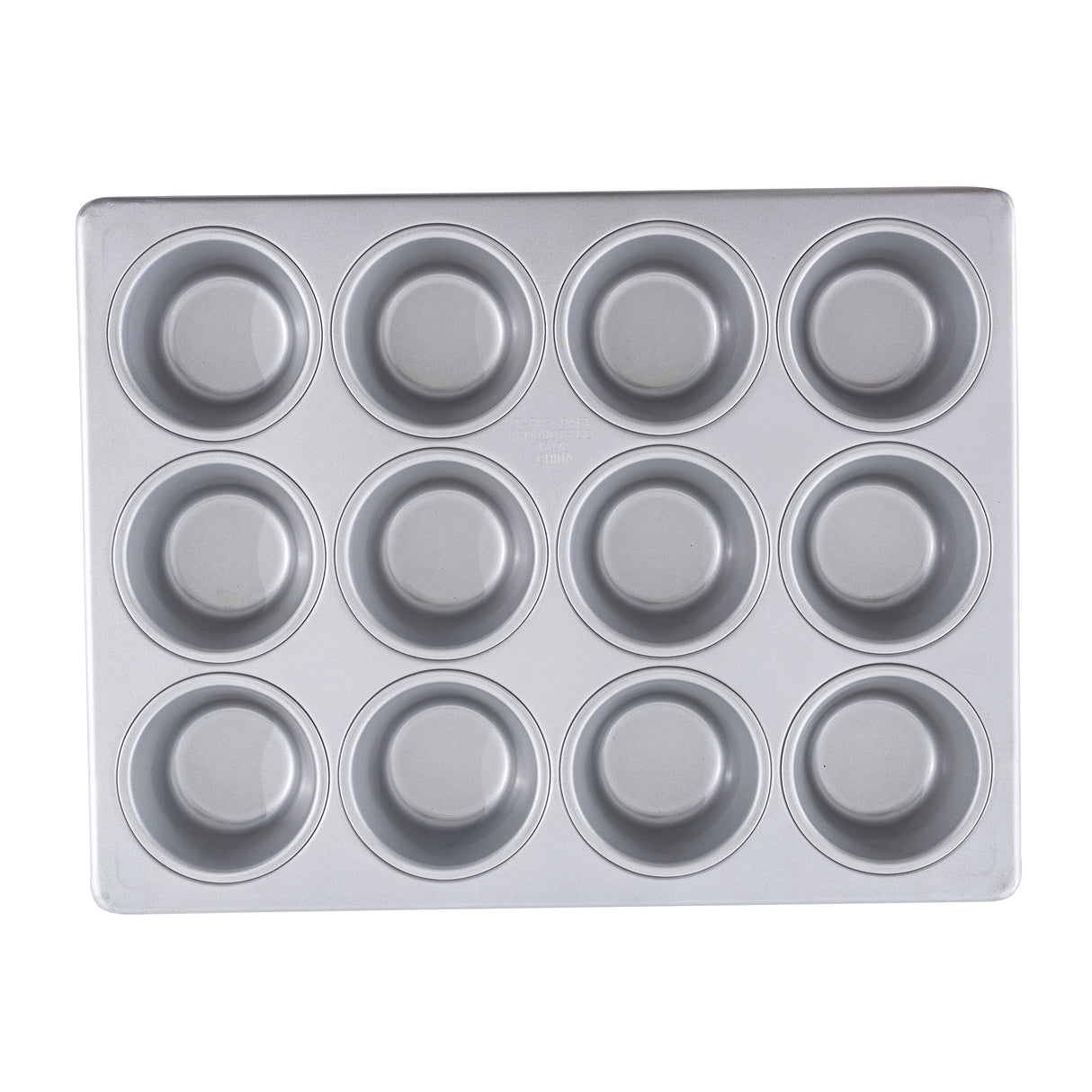 A clean, silver muffin pan with a non-stick surface, featuring twelve round cups in a 3 by 4 grid. The pan is empty and viewed from above against a white background.