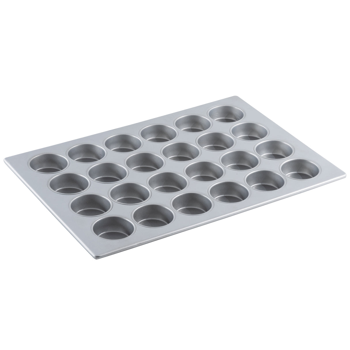 A silver non-stick muffin pan with 24 round cups arranged in a 4 by 6 grid, set on a white background. The tray is angled slightly, highlighting the cup depth and smooth cupcake pan surface.