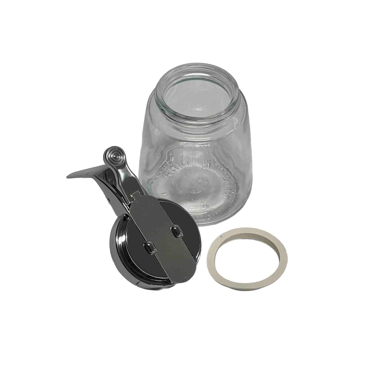 A clear, dishwasher safe glass jar with a wide mouth sits opened. In front of it are a chrome plated clamp-style lid and a separate beige rubber sealing ring—essential parts for airtight food storage or canning on a white background.