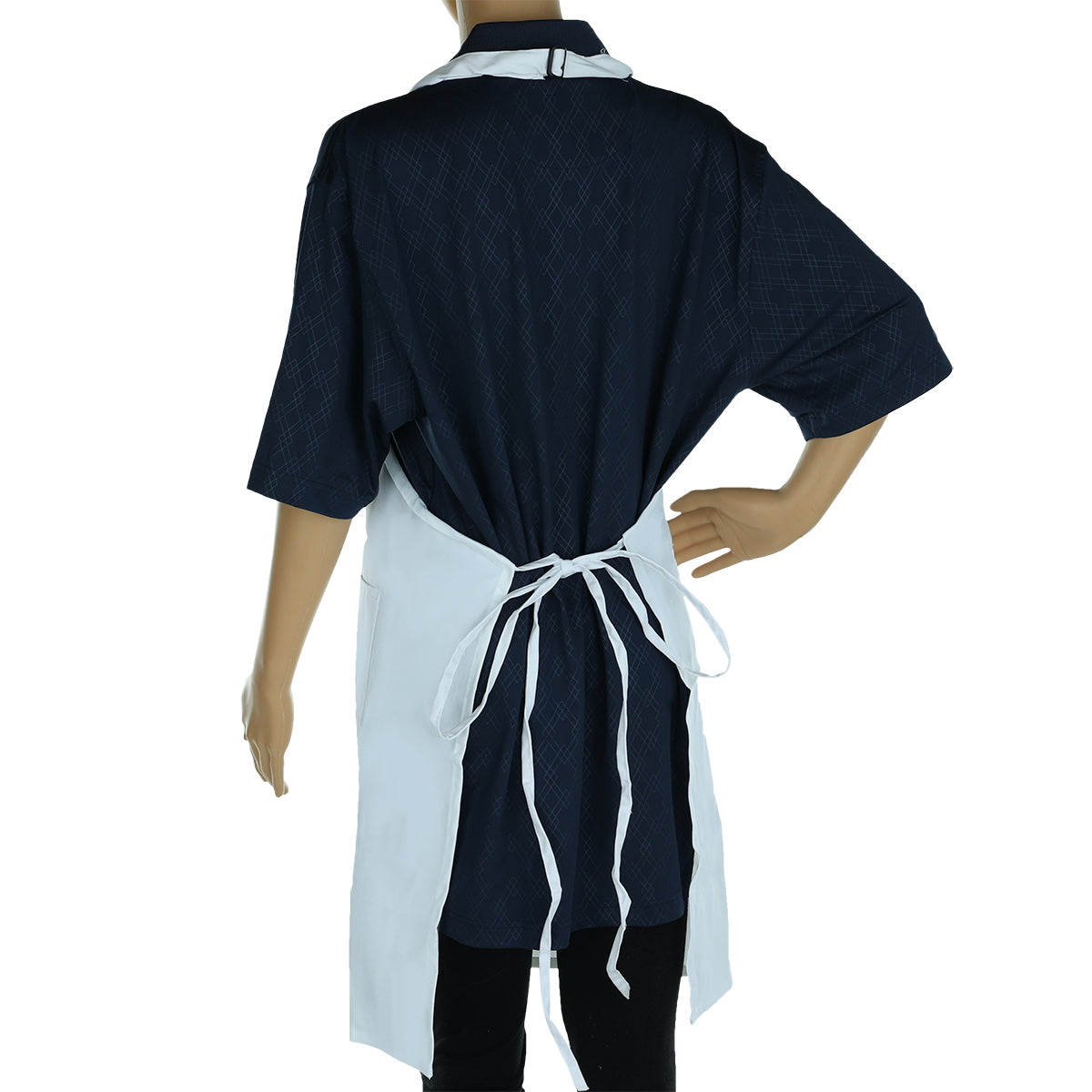 A mannequin wears a dark, short-sleeved shirt and a white poly-cotton blend bib apron tied at the back in a neat bow. The mannequin’s left hand rests on its hip against a plain white background.