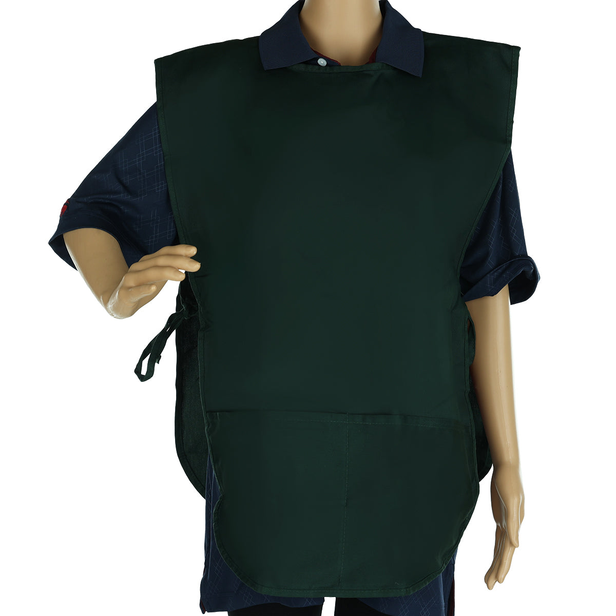 A mannequin in a dark blue collared shirt wears a dark green, machine washable cobbler apron with side ties. The apron, made from a durable poly-cotton blend, covers the torso and upper legs; one arm is bent while the other rests by its side.