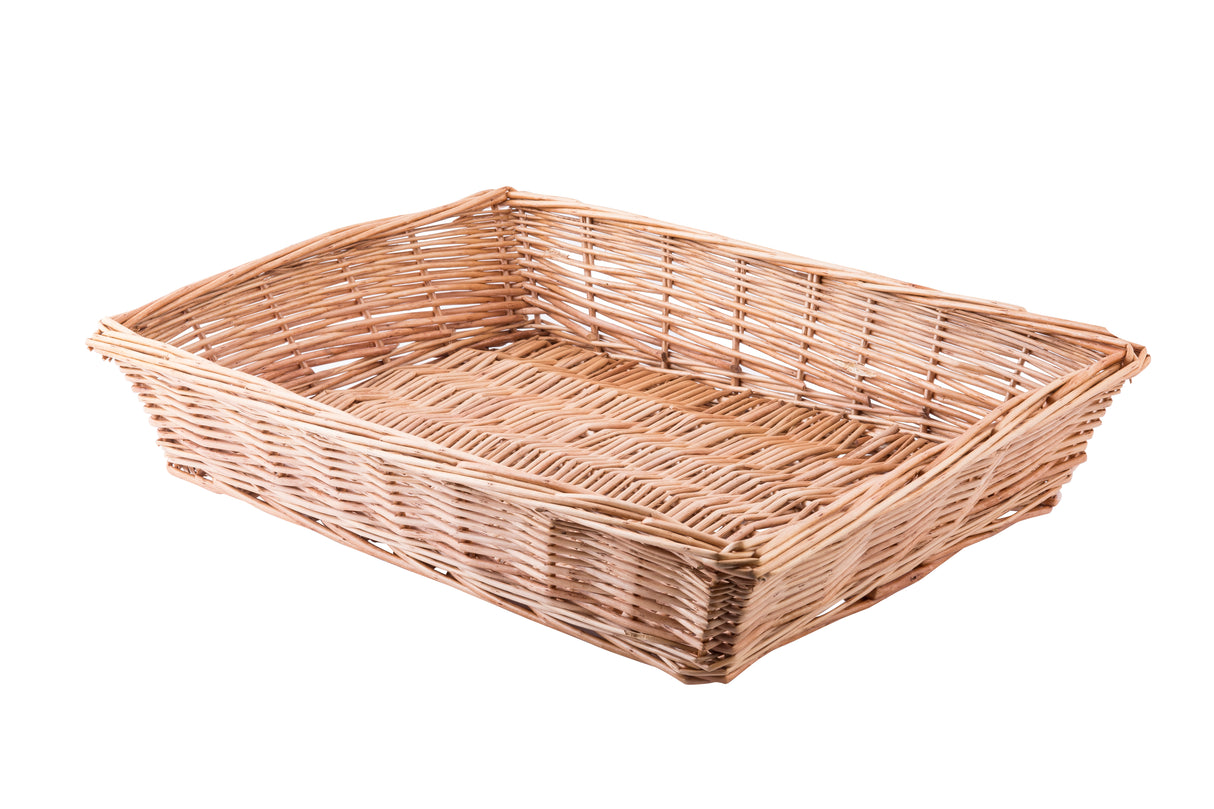 A rectangular wicker basket with high sides and an open top, this handwoven basket features a light brown woven pattern throughout. The empty basket rests against a plain white background.