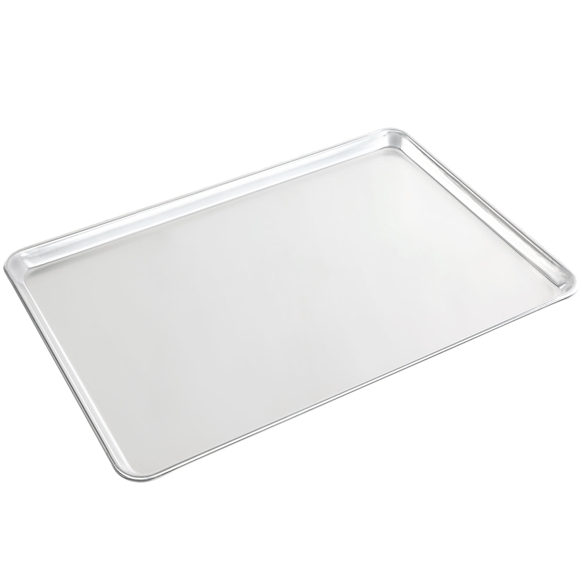A plain, rectangular full size sheet pan made of heavy weight aluminum with slightly raised edges sits on a white background. Its smooth, reflective surface is angled to show the flat area and shallow sides.