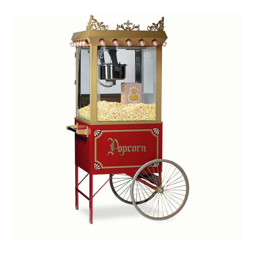 A vintage-style Antique Citation Popper popcorn cart with gold trim, large spoked wheels, a glass display case filled with popcorn, a striped popcorn box inside, and "Popcorn" in ornate gold lettering along the side.