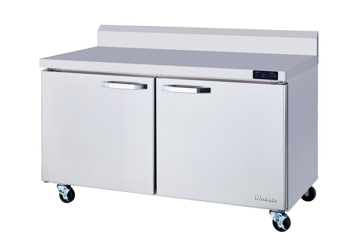 A sleek, reflective two-section stainless steel Work Top Freezer on four caster wheels features solid bar-handled doors, a flat countertop with raised backsplash, and a convenient digital control panel on the right side.