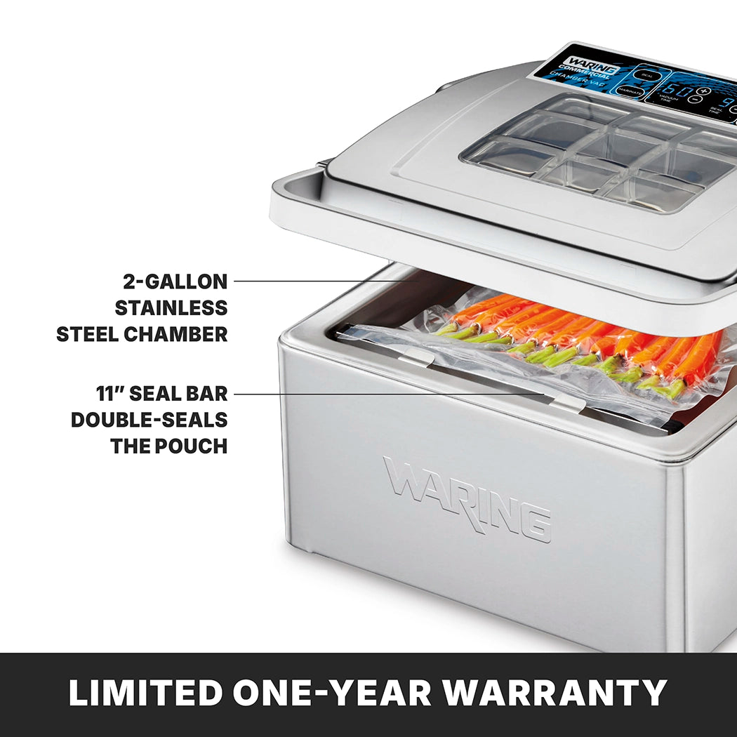 A Waring Vacuum Packaging Machine with its lid open sits on a countertop, sealing vacuum bags filled with orange items. Labels highlight the 2-gallon stainless steel chamber and 11-inch seal bar. Text below reads: LIMITED ONE-YEAR WARRANTY.