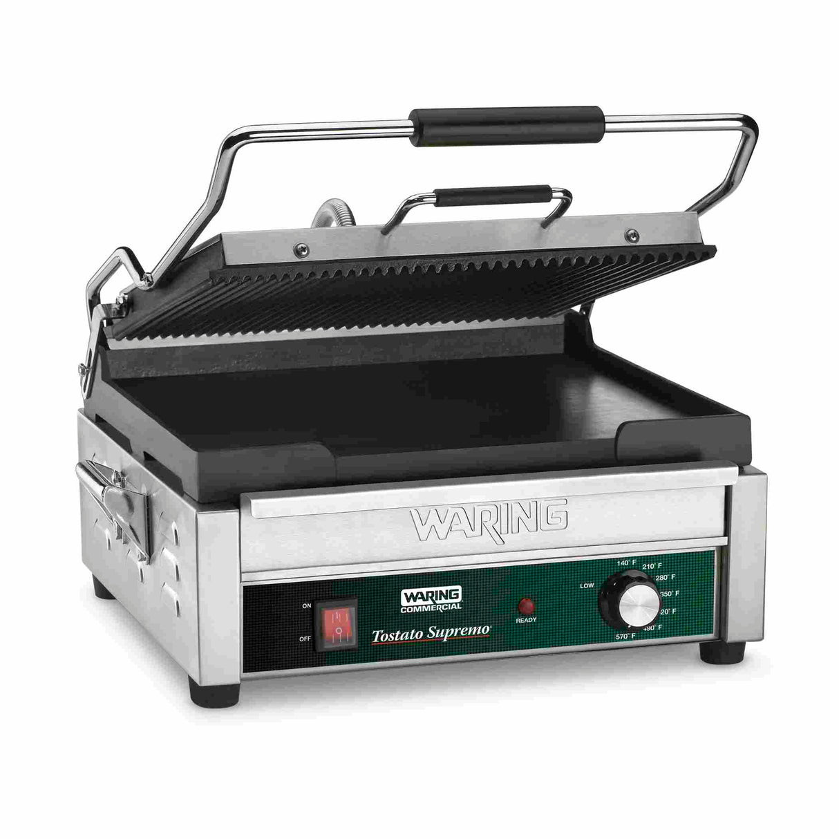 A stainless steel panini grill with a ridged top plate open at an angle and a flat bottom plate. It features a black handle, indicator lights, temperature control knob, and the “Waring Toastato Supremo” label on the front panel.