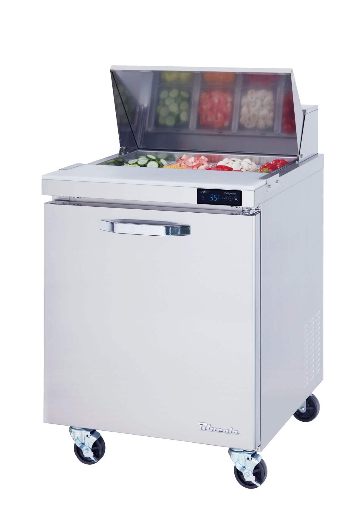 The Blue Air BLPT28-HC Sandwich Prep Table features 7.0 cu. ft. of storage, a stainless steel build on wheels, trays of sliced vegetables under a raised glass lid, and a digital temperature display on the front.