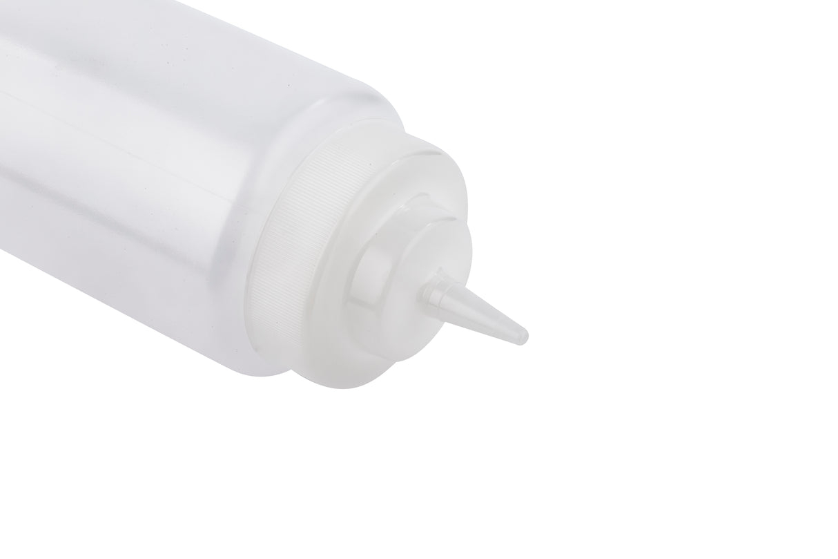 A clear, empty 32 oz squeeze bottle with a pointed nozzle cap lies on its side against a white background. The cylindrical, translucent WideMouth Squeeze Bottle features a ribbed cap for gripping and is dishwasher safe for easy cleaning.