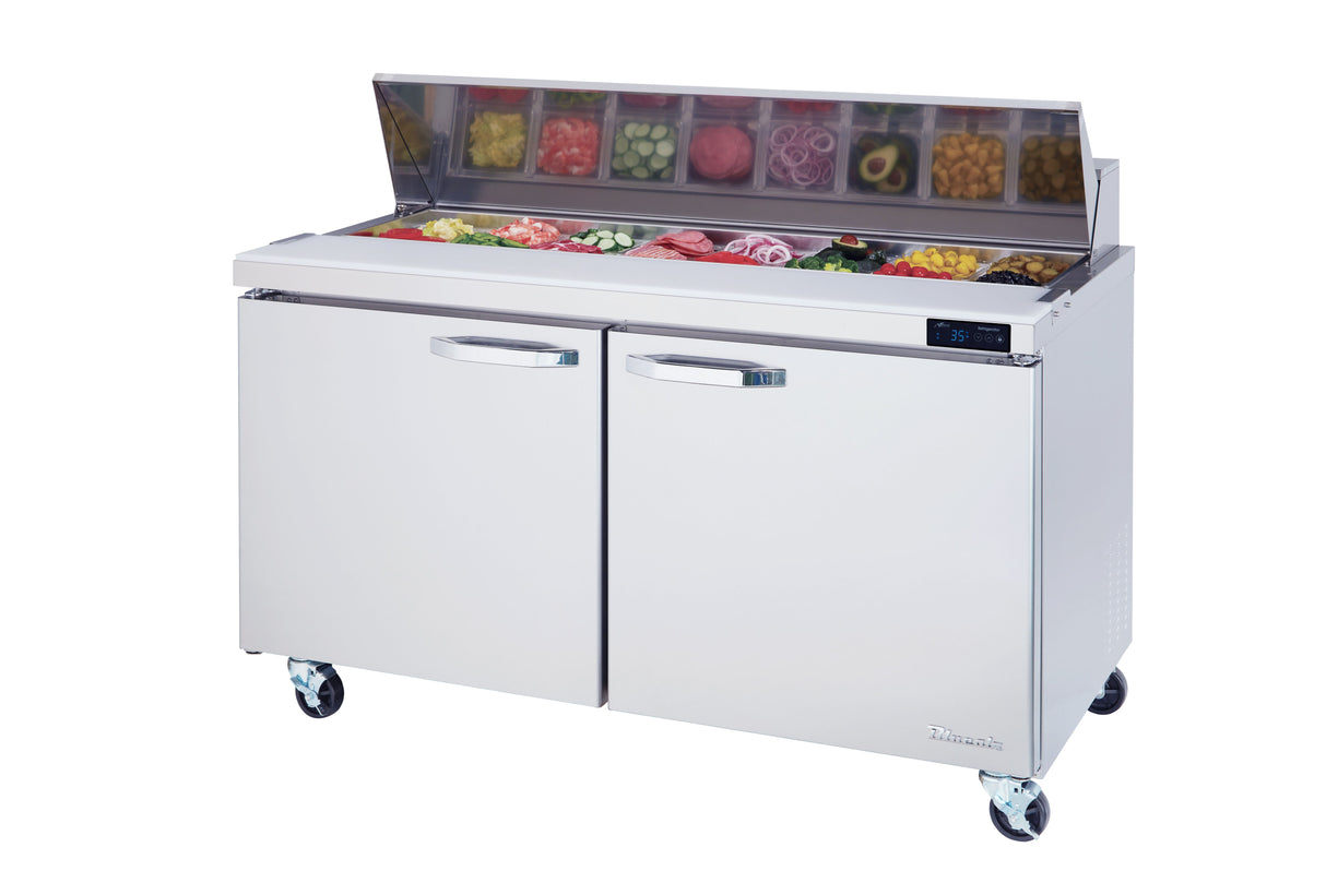 The Blue Air BLPT60-HC refrigerated prep table features two doors and caster wheels. Its open top lid reveals assorted sliced vegetables and ingredients in separate containers, ready for food prep, with a digital temperature display on the right.