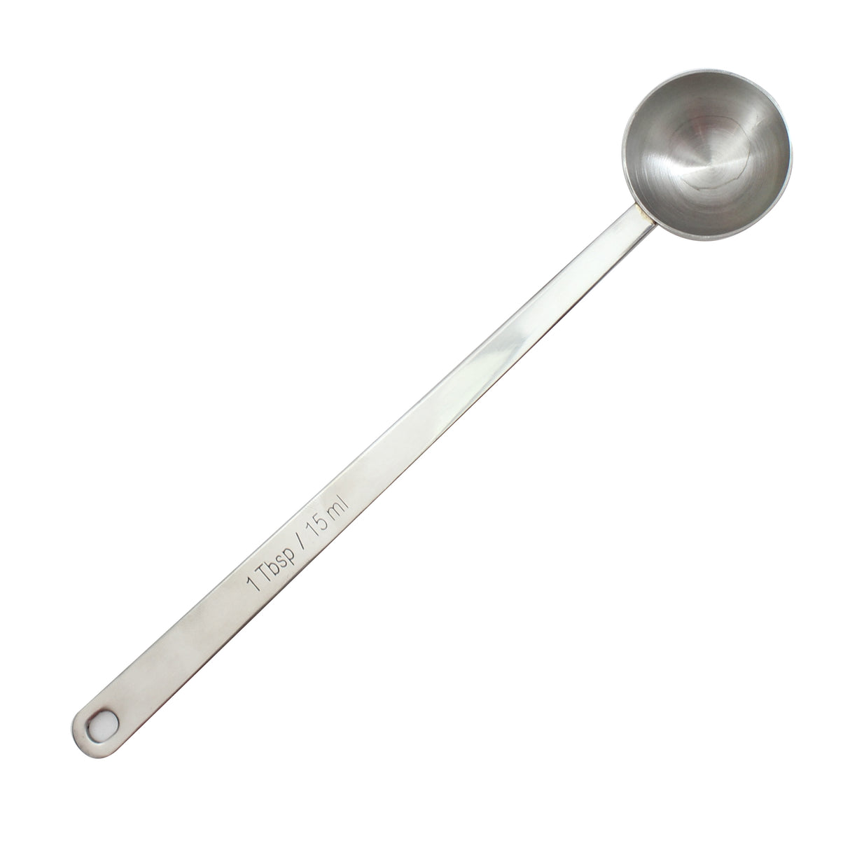 A long handled stainless steel measuring spoon with a round, shallow bowl. The handle is engraved with 1 Tbsp / 15 ml and features a small hole at the end for hanging. The background is plain white.