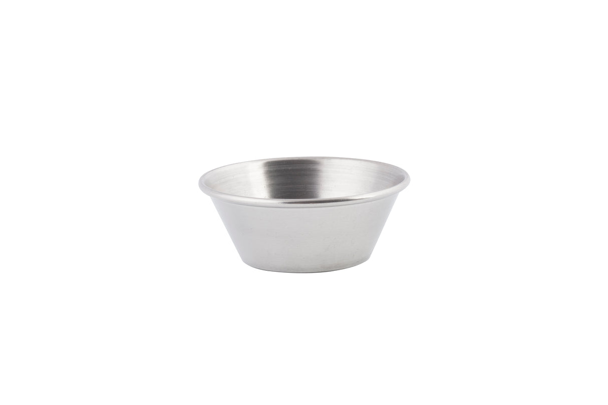 A small, empty stainless steel sauce cup with a shiny silver finish sits centered on a plain white background. The cup has smooth sides that taper slightly toward the base and a rounded rim.