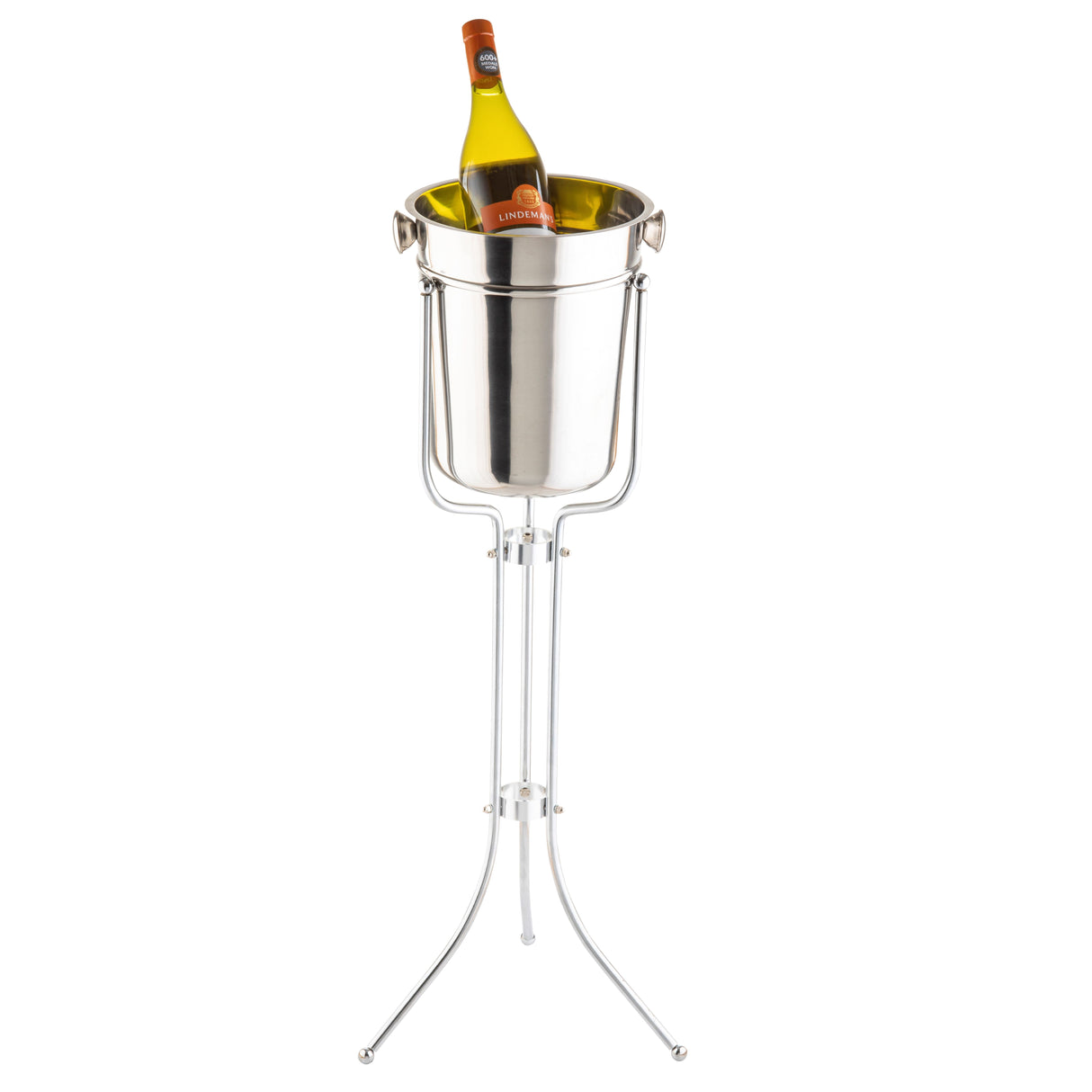 A chrome plated Wine bucket stand by TableCraft, featuring three slender legs and a bucket with side handles, holds a chilled bottle of white wine upright. The yellow label and cap are visible above the rim for easy identification.