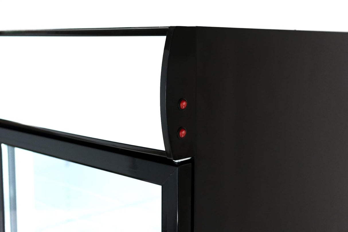 Close-up of the top corner of an Empura EGM-50B commercial refrigerated merchandiser with glass panels. Two small red indicator lights are visible on the side, emphasizing its clean, modern lines and temperature-controlled display against a white background.