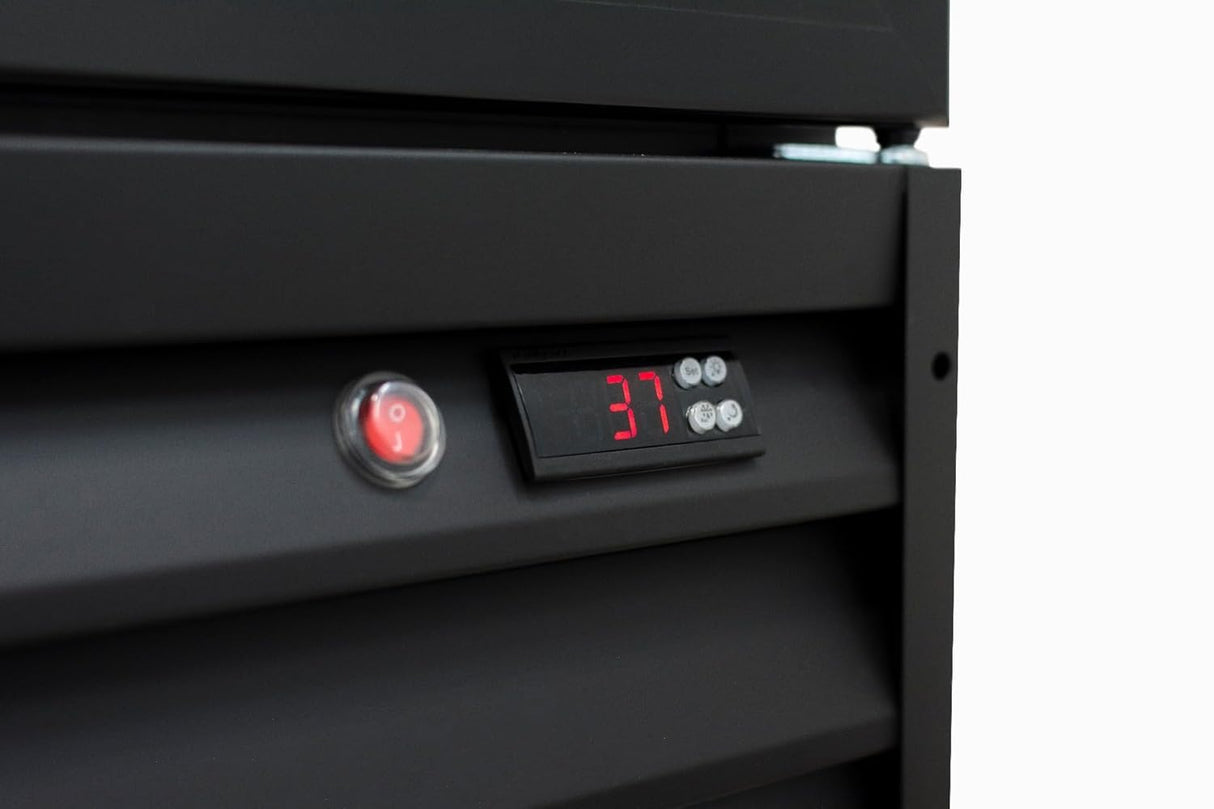Close-up of a black Empura EGM-50B commercial refrigerated merchandiser, featuring a red power switch on the left and a temperature-controlled display showing 37 in red, surrounded by four gray buttons. The background is plain white.