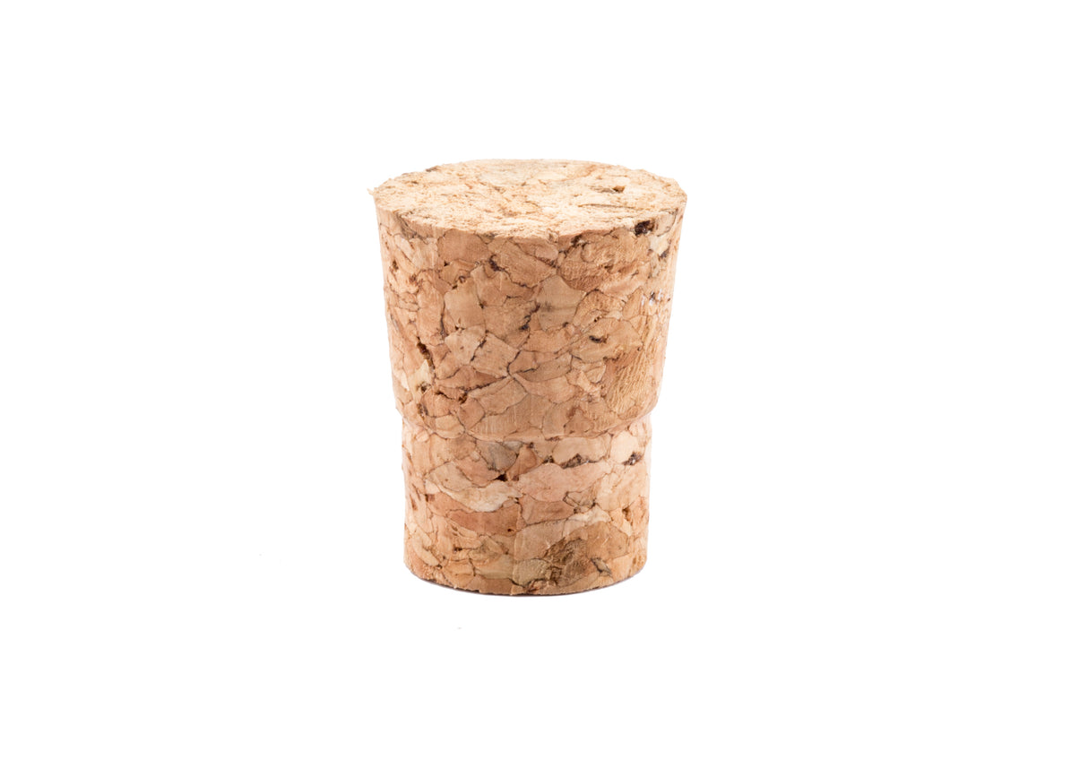 A single TableCraft Cork Stopper stands upright on a white background. The cylindrical cork features a slightly uneven texture and visible grain patterns. Hand wash only; there are no other objects or markings in the image.