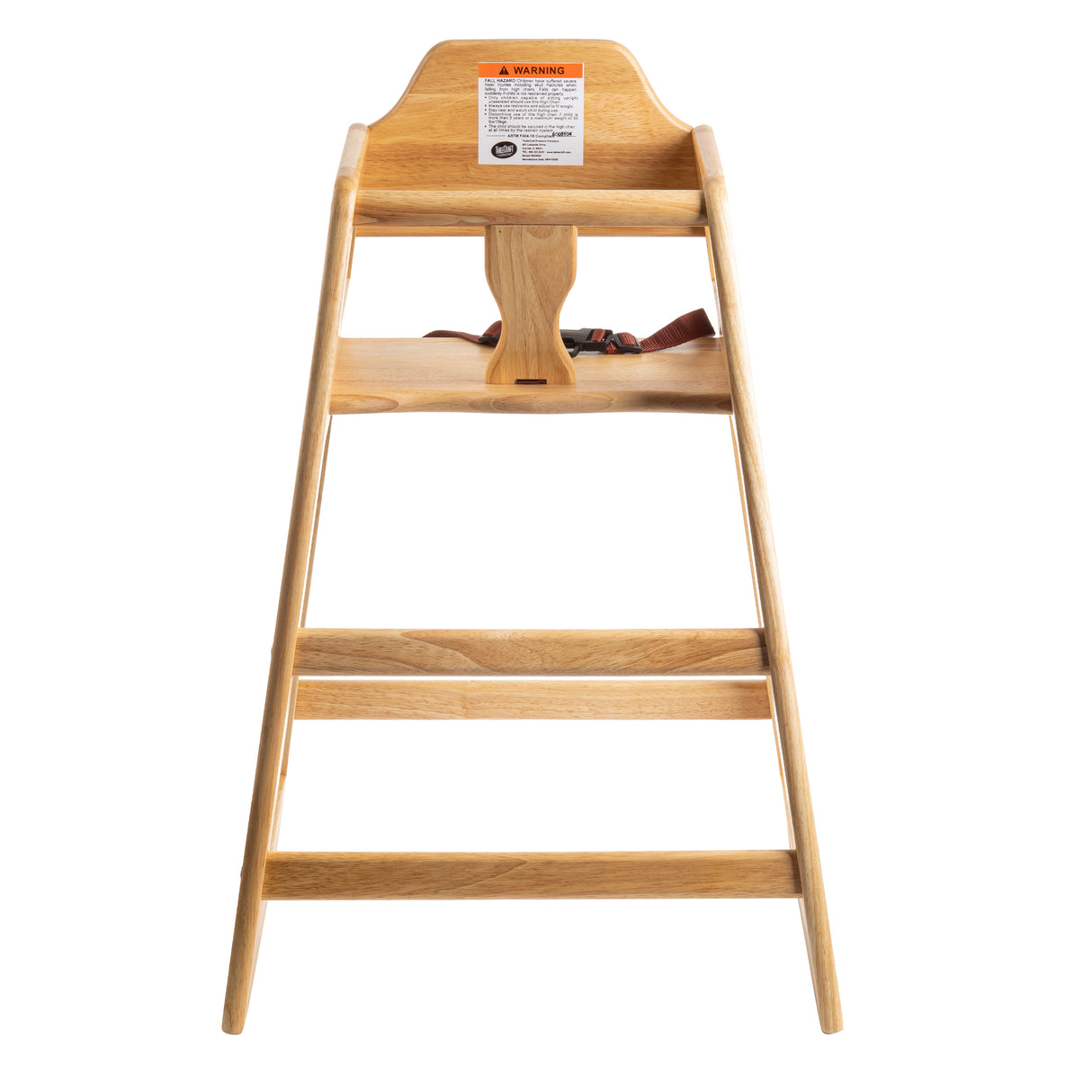 A wooden high chair with a wide base, angled legs, safety straps, and a warning label on the backrest. Viewed from the front against a white background, this stackable chair features a simple, sturdy design and natural wood finish.