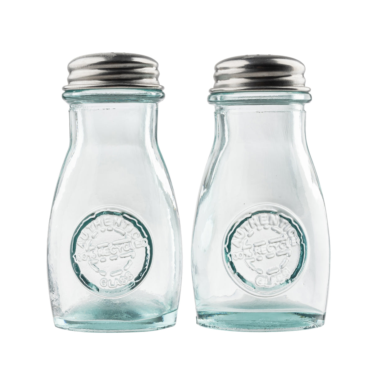 Two empty, clear recycled glass jars with stainless steel tops are side by side. Each shaker has a round embossed logo on the front reading Authentic Recycled Glass. The background is plain white, and the shakers are clean and unused.
