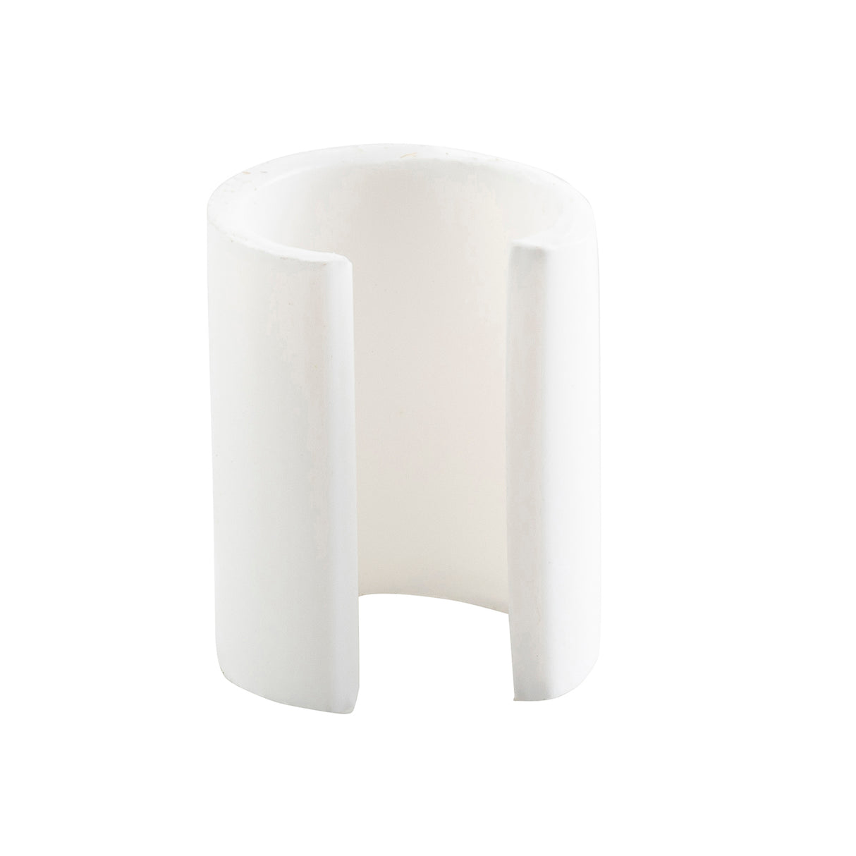 A white, cylindrical ceramic object with a vertical slit running from the base to nearly the top resembles a pump restrictor. Hollow and partial tube-shaped, its smooth surface and plain white background give it a minimalist appearance.