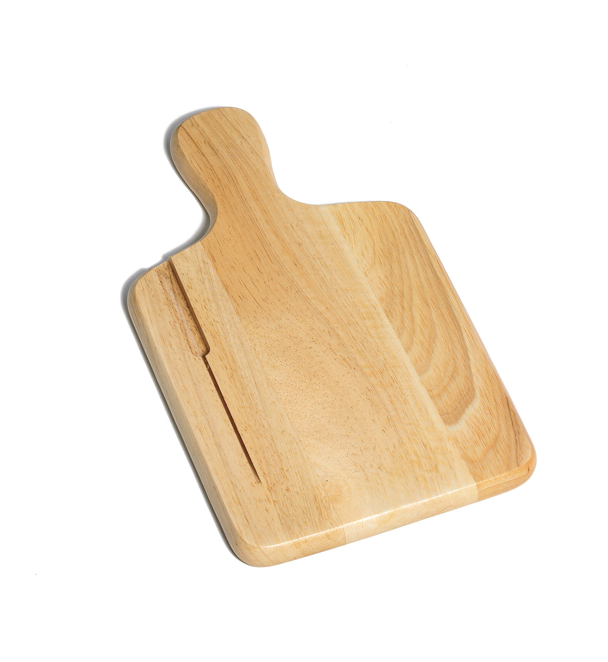 A rectangular light wood bread board with rounded edges and a handle. The board features a shallow groove running along one side. It is photographed on a white background, casting a faint shadow to the left.