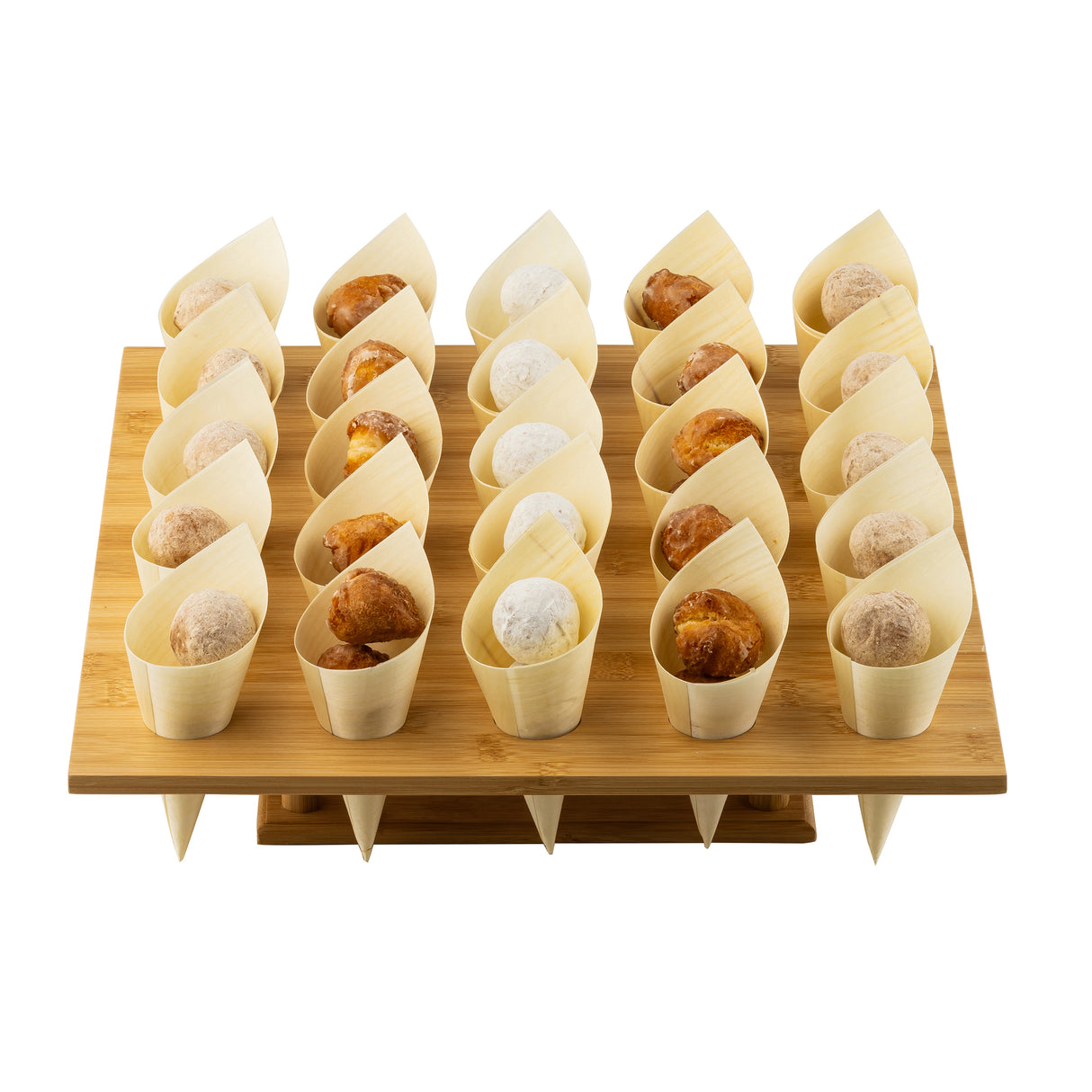 A wooden serving tray holds 20 eco-friendly, biodegradable Disposable Serving Cones, each with a donut hole—some dusted in white powdered sugar, others in light brown cinnamon sugar—arranged neatly in alternating rows.