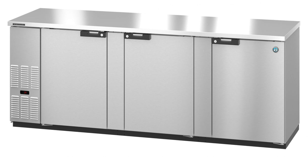 A Hoshizaki BB95-S Refrigerated Back Bar Cooler, this large three-section stainless steel under-counter unit features three doors with black handles, a control panel on the left, brand logo on the right door, flat countertop surface, and ventilation grilles bottom left.
