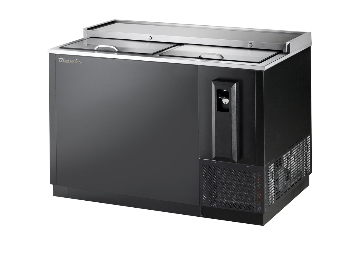 A sleek, industrial 50 inch bottle cooler featuring sliding stainless steel lids, a right-side vented refrigeration unit, and a built-in bottle opener with cap catcher. This commercial unit sits on short legs for easy cleaning underneath.