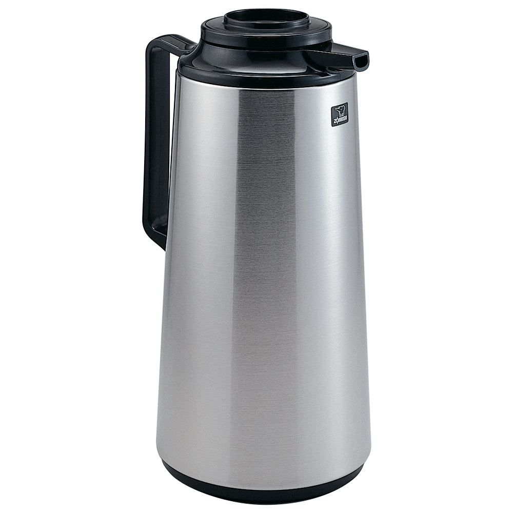 A stainless steel Brew-Thru Carafe with a sleek, tapered design. It features a black plastic handle and lid, glass vacuum insulated for optimal heat retention, plus a spout for pouring and a small logo near the top.
