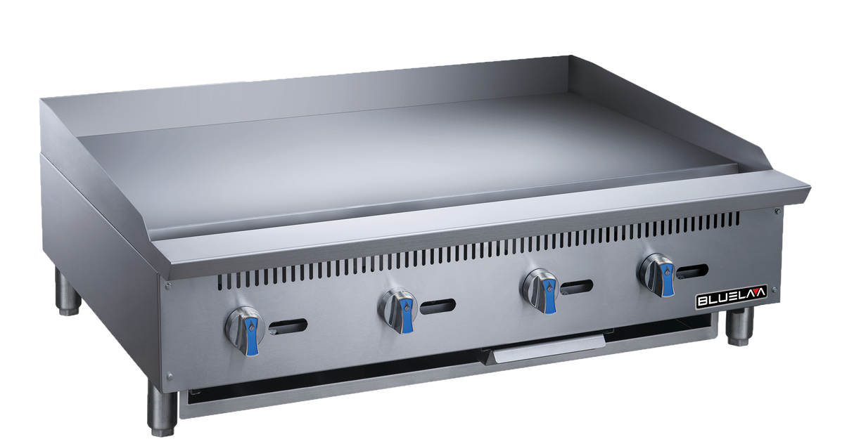 A large stainless steel heavy duty gas griddle with four blue-handled manual control knobs, a flat cooking surface, raised back and sides, vent slits, and short legs. The “BLUEVAN” logo appears on the lower right front panel.