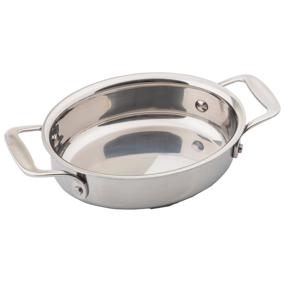 A shiny, stainless steel Induction Mini Casserole, oval-shaped with two wide handles, is seen angled from above. Its reflective and smooth interior and polished exterior stand out. This pan is oven safe and rests empty on a white background.