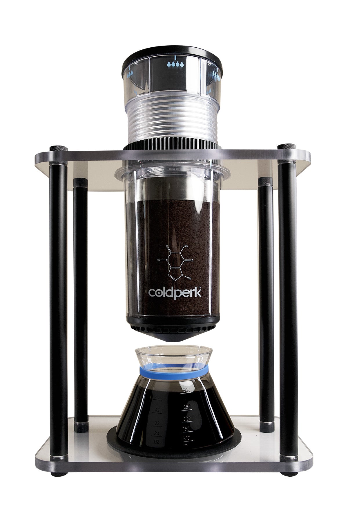 A modern cold brew coffee system with a transparent cylindrical chamber containing coffee grounds, supported by a sleek black and silver frame. Below, a glass carafe collects the brewed coffee. The compact countertop design is branded coldperk.
