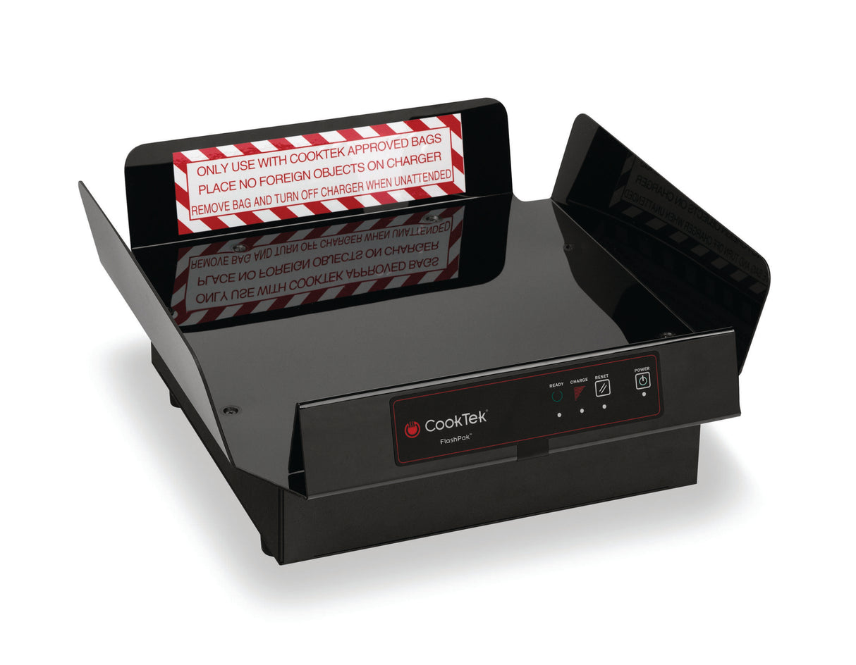 A black CookTek Pizza Thermal Delivery System charger with a digital display and control buttons on the front. Safety instructions in red and white are printed on a sign attached to the rear panel, and angled side panels guide no-leak food bags onto the charger.